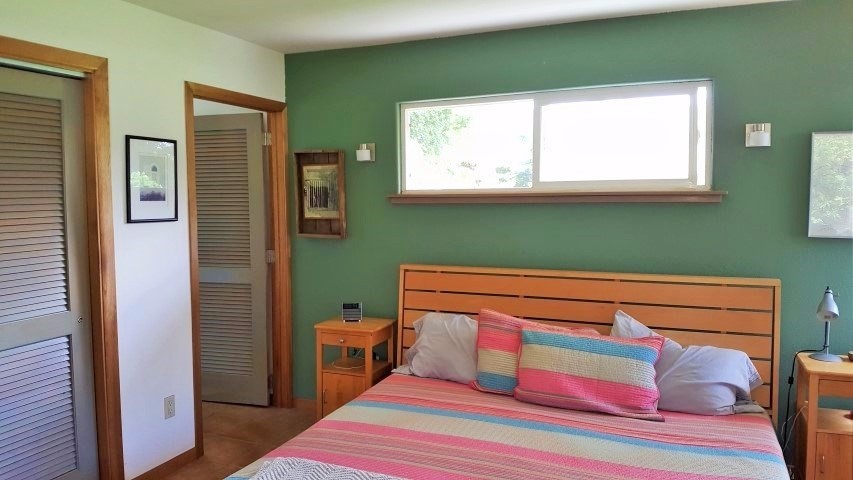 5004 Awawa Road Eleele, HI 96705 - Photo 14 of 21 a bedroom with a bed and a window