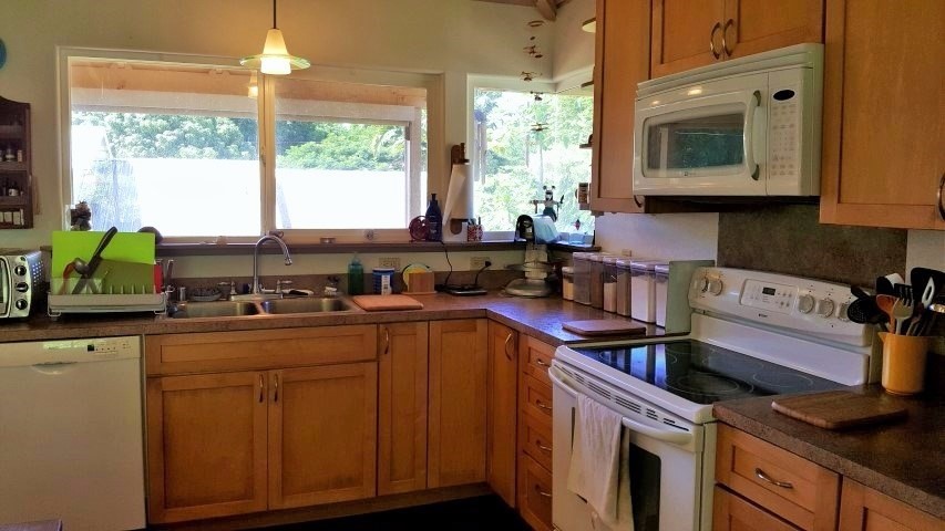 5004 Awawa Road Eleele, HI 96705 - Photo 8 of 21 a kitchen with a sink cabinets and window