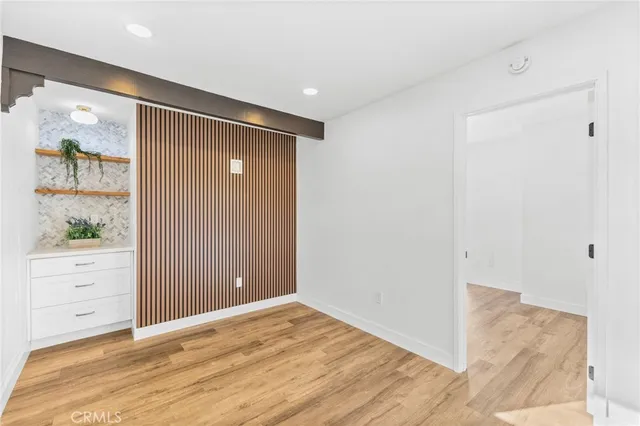 a view of a backyard with a garden and plants