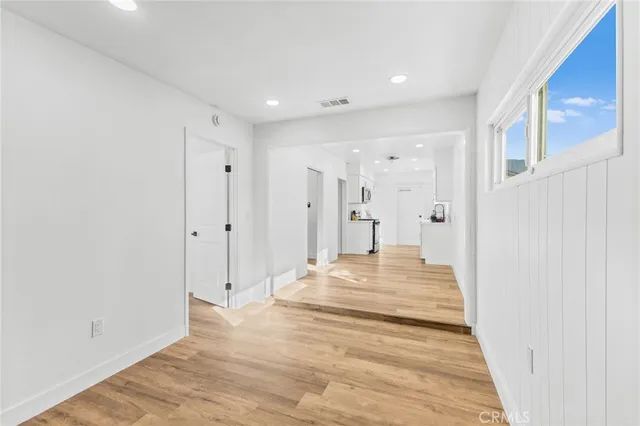 a view of a swimming pool with an outdoor space and seating area