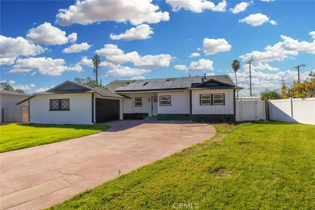a view of a house with backyard porch and patio