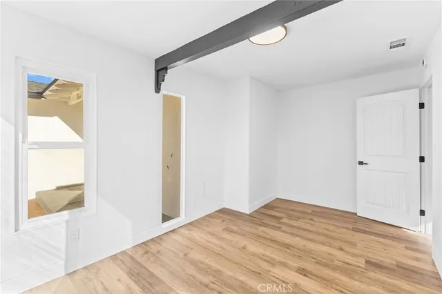 a view of a swimming pool with a yard