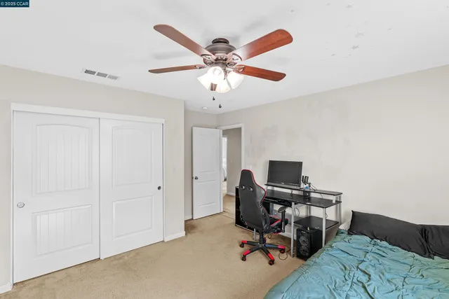 a workspace with furniture and a window