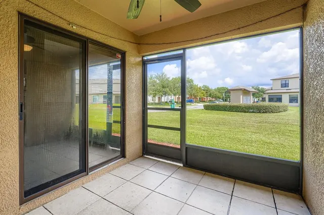 a view of an empty room and window