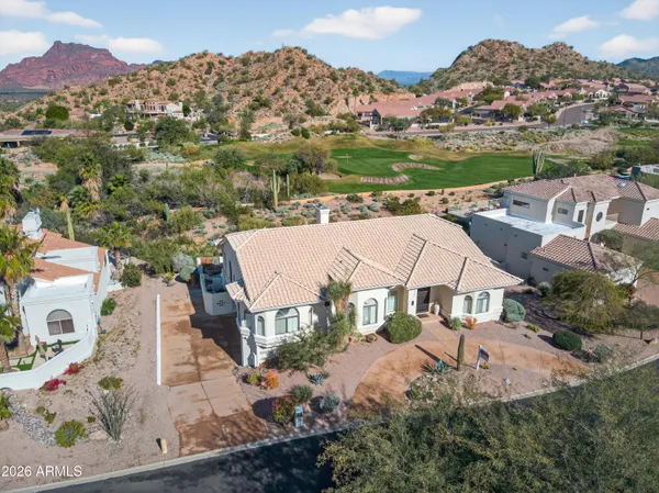 an aerial view of a house with a garden