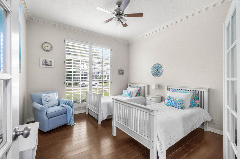 2620 Windham Court Delray Beach, FL 33445 - Photo 18 of 58 a bedroom with a bed and a couch