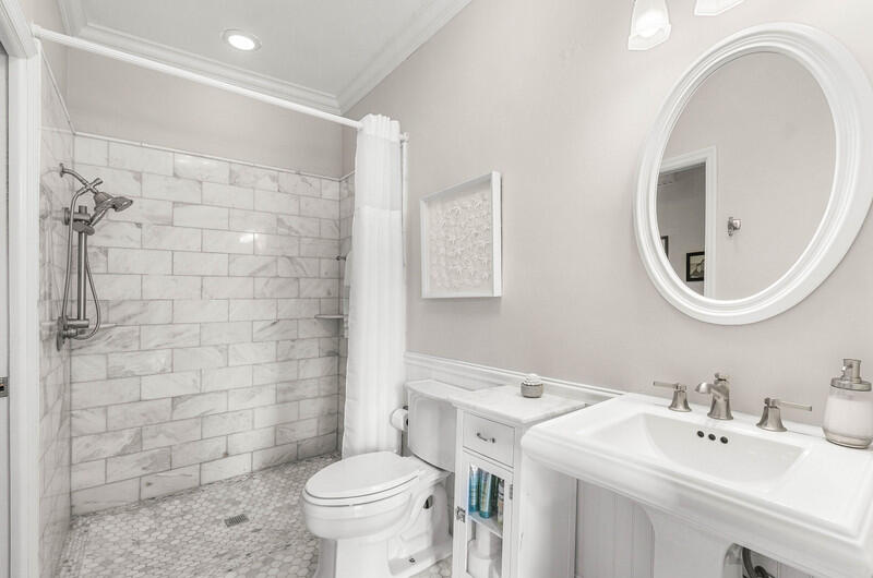 2620 Windham Court Delray Beach, FL 33445 - Photo 20 of 58 a bathroom with a sink a toilet and a mirror