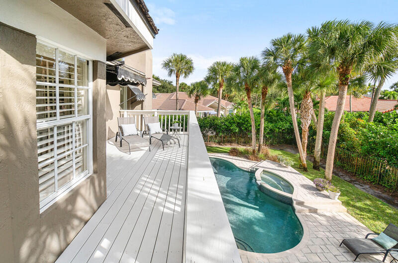 2620 Windham Court Delray Beach, FL 33445 - Photo 30 of 58 a view of a swimming pool with a patio