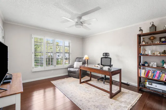 a view of a swimming pool with a patio