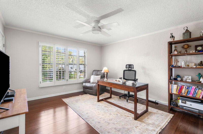 2620 Windham Court Delray Beach, FL 33445 - Photo 31 of 58 a workspace with furniture hardwood and a window