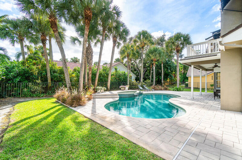 2620 Windham Court Delray Beach, FL 33445 - Photo 35 of 58 a view of a swimming pool with a patio