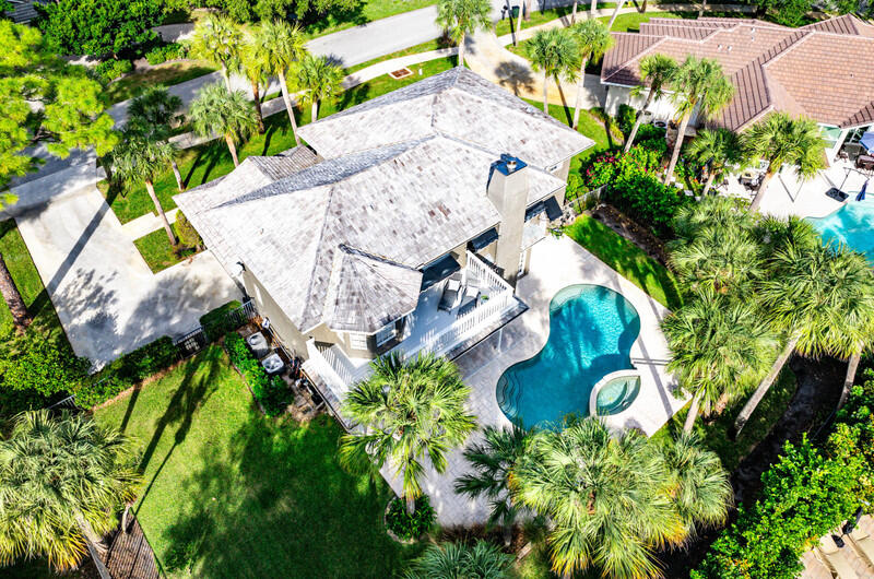 2620 Windham Court Delray Beach, FL 33445 - Photo 44 of 58 a backyard of a house with lots of green space