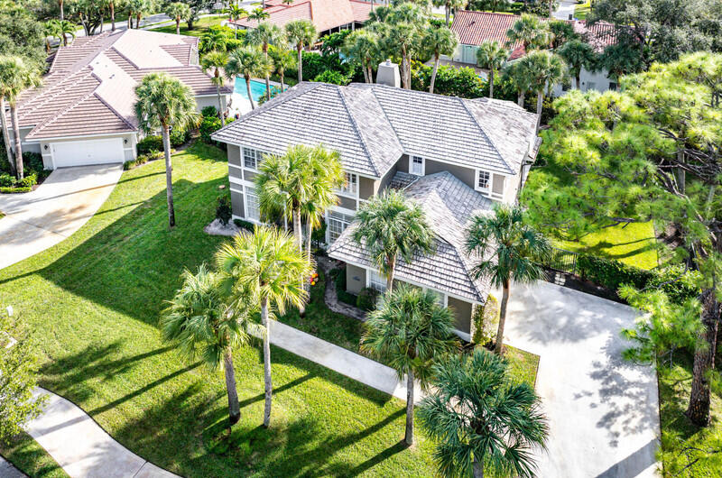 2620 Windham Court Delray Beach, FL 33445 - Photo 48 of 58 a aerial view of a house with swimming pool and garden