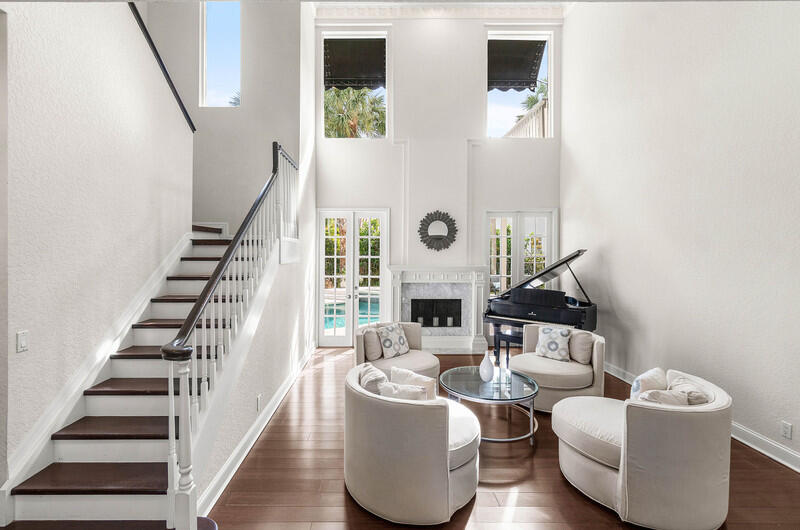 2620 Windham Court Delray Beach, FL 33445 - Photo 5 of 58 a living room with furniture and a large window
