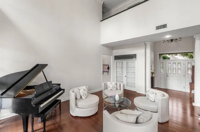 a view of dining room and wooden floor