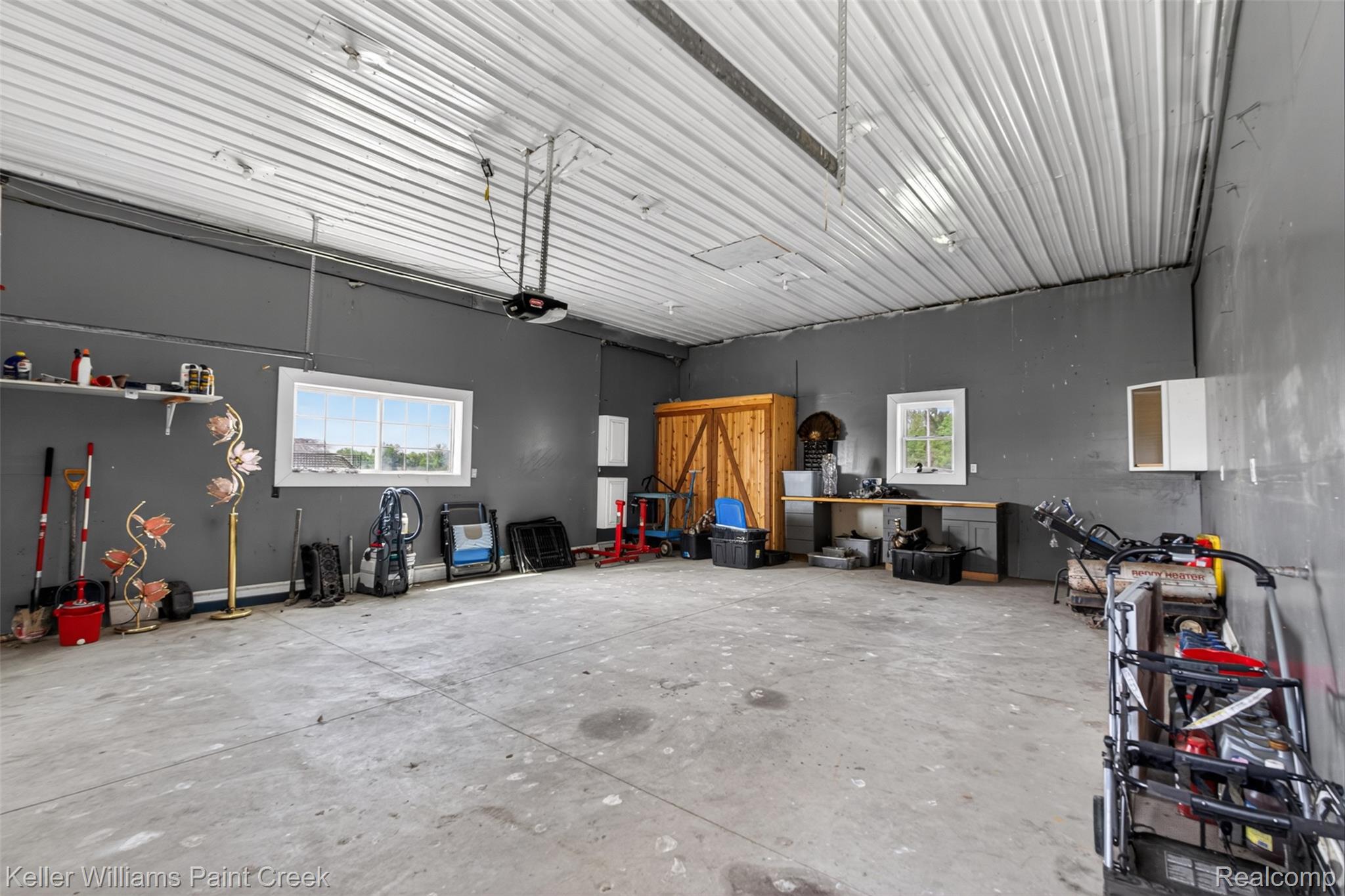 18125 Nelson Road St. Charles, MI 48655 - Photo 47 of 63 Garage featuring a garage door opener