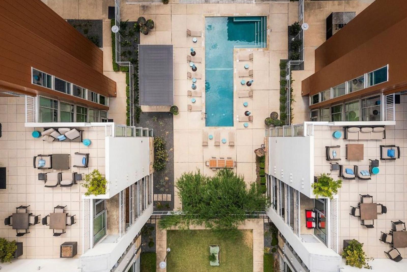 1600 Barton Springs Road, Unit 2302 Austin, TX 78704 - Photo 10 of 12 Drone / aerial view of a pool