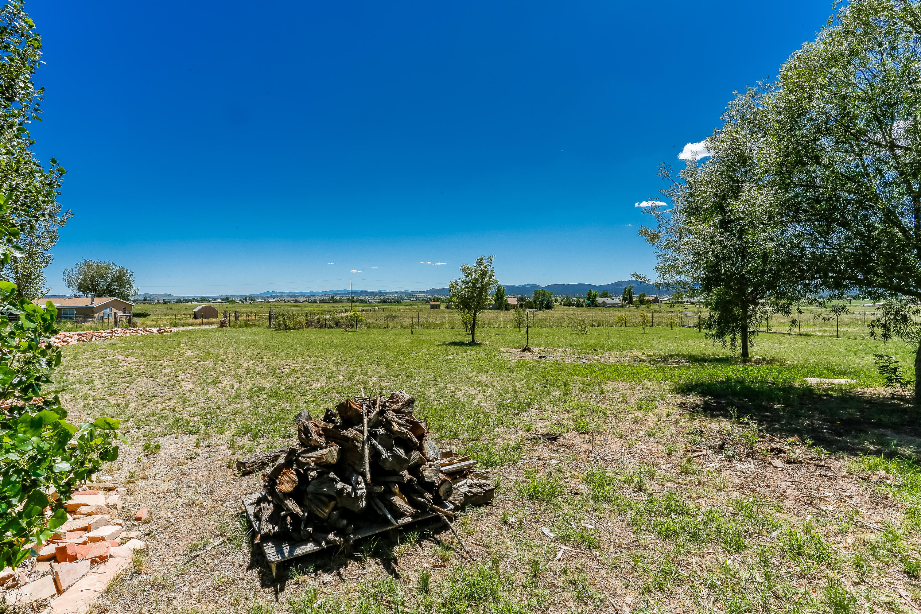 1900 West Big Sky Ranch Road Paulden, AZ 86334 - Photo 22 of 39 a view of a lake with a big yard