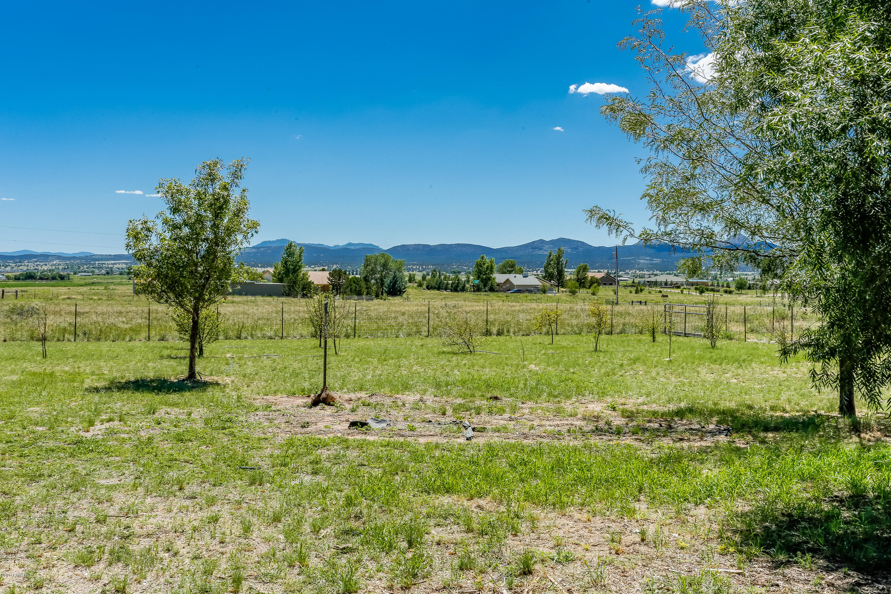 1900 West Big Sky Ranch Road Paulden, AZ 86334 - Photo 24 of 39 a view of a golf course with a lake