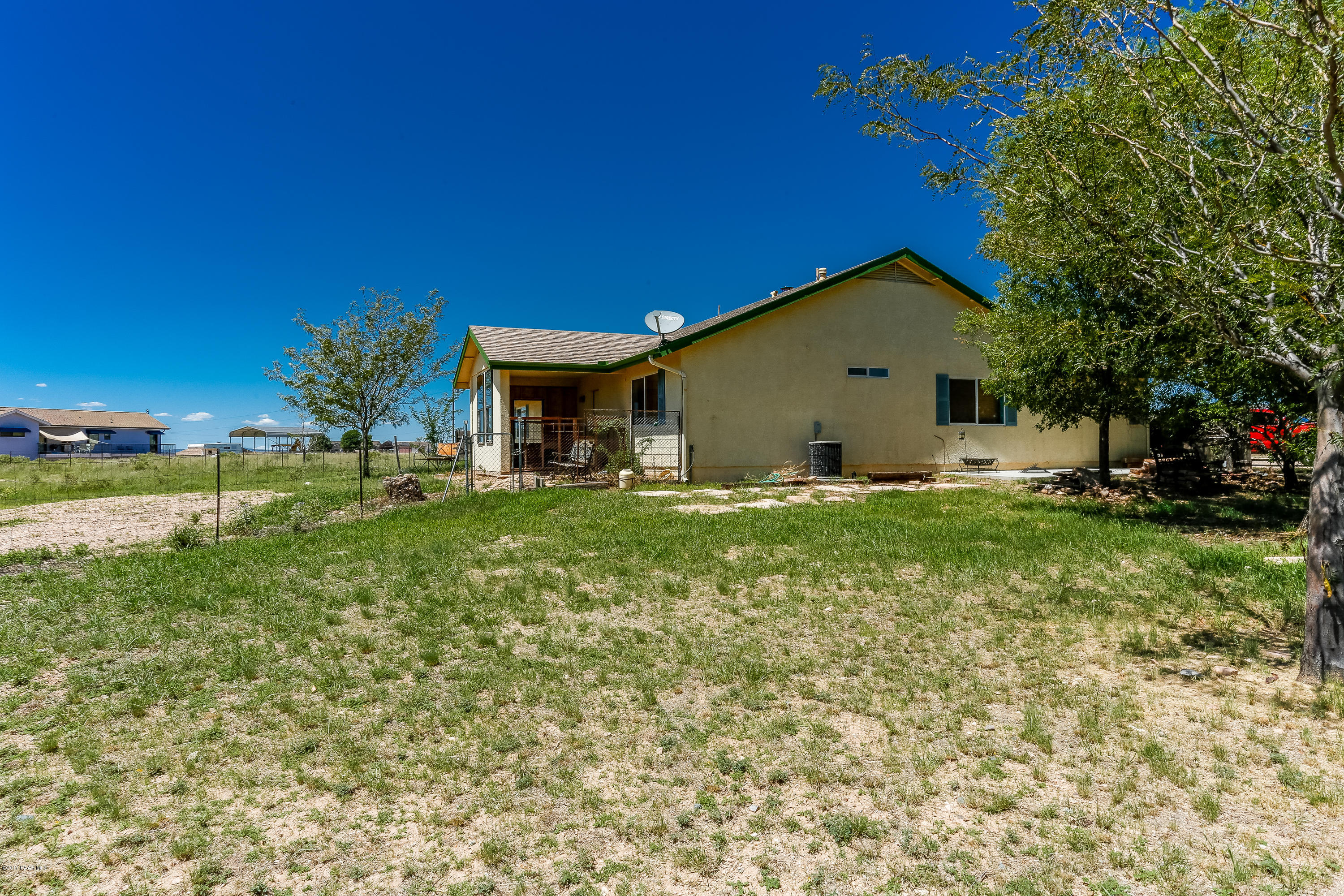 1900 West Big Sky Ranch Road Paulden, AZ 86334 - Photo 38 of 39 a front view of house with yard and trees