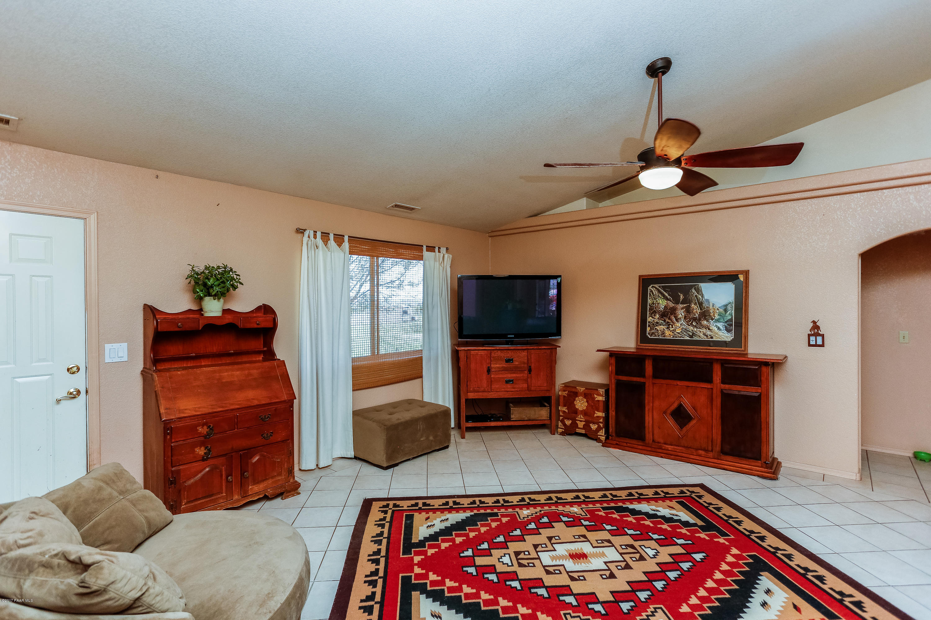 1900 West Big Sky Ranch Road Paulden, AZ 86334 - Photo 8 of 39 a living room with furniture and a flat screen tv