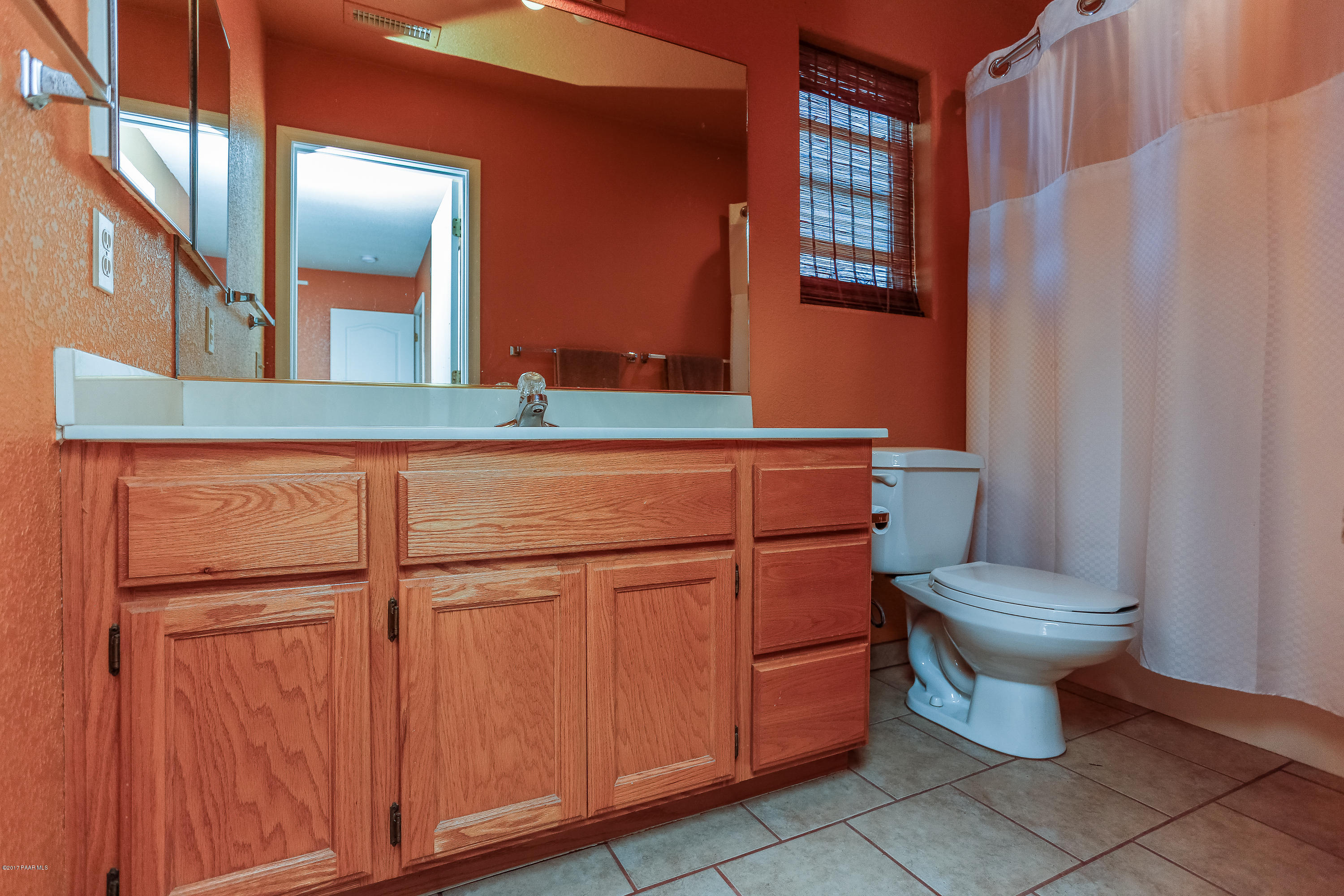 1900 West Big Sky Ranch Road Paulden, AZ 86334 - Photo 9 of 39 a bathroom with a toilet and a sink