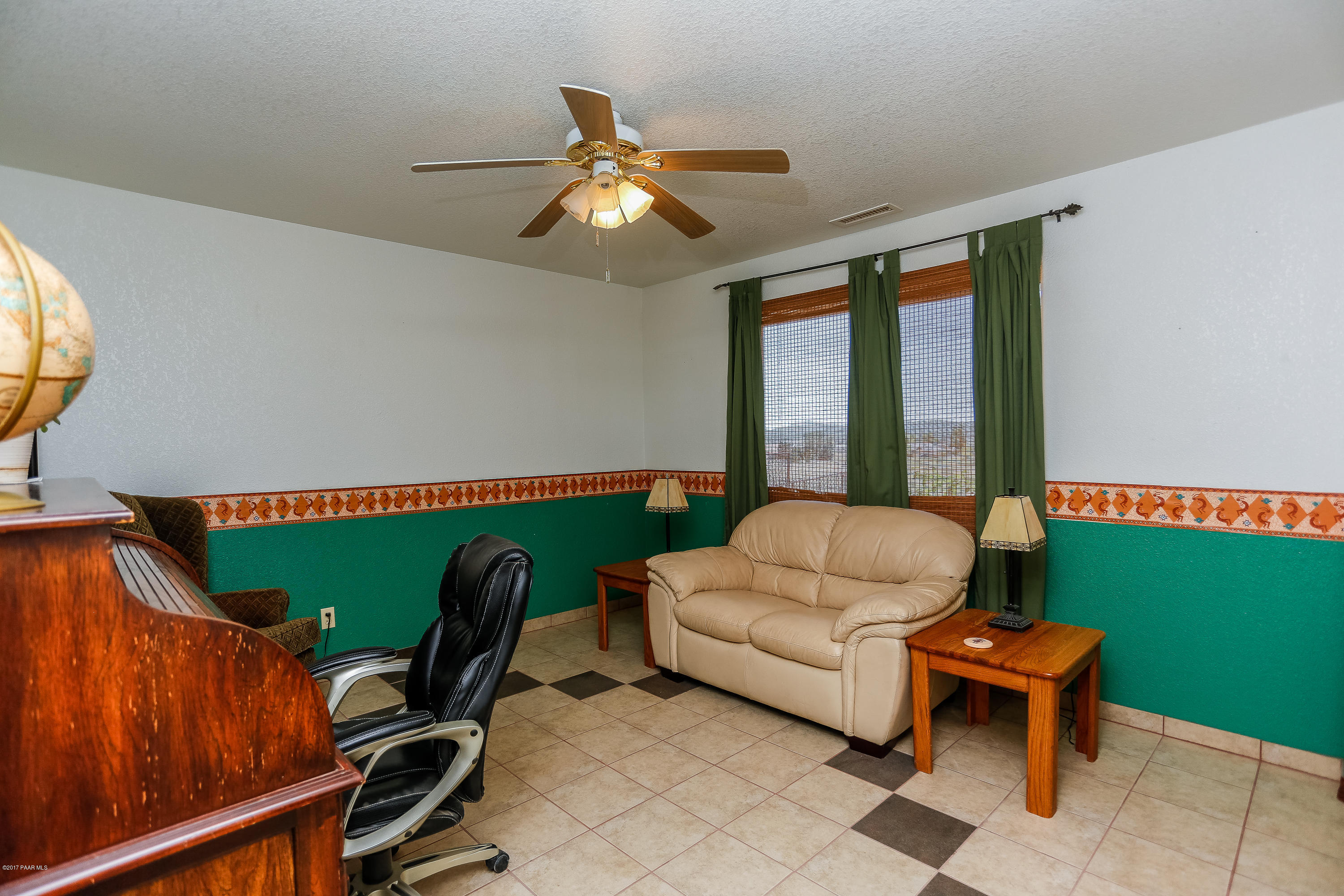 1900 West Big Sky Ranch Road Paulden, AZ 86334 - Photo 10 of 39 a living room with furniture and a window