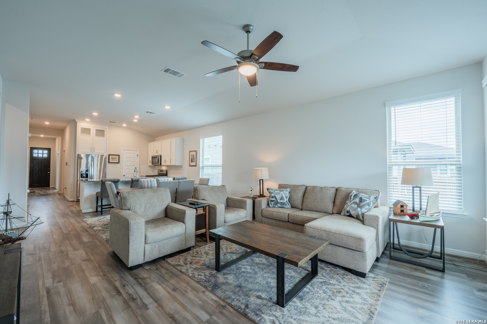 4947 Ranahan Pass St. Hedwig, TX 78152 - Photo 12 of 37 a living room with furniture and a large window