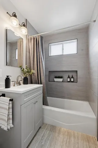 a bed room with a bed and a chair