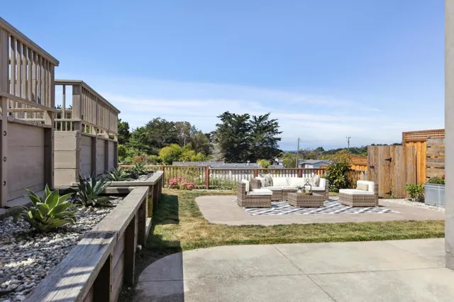 a front view of a house with barbeque