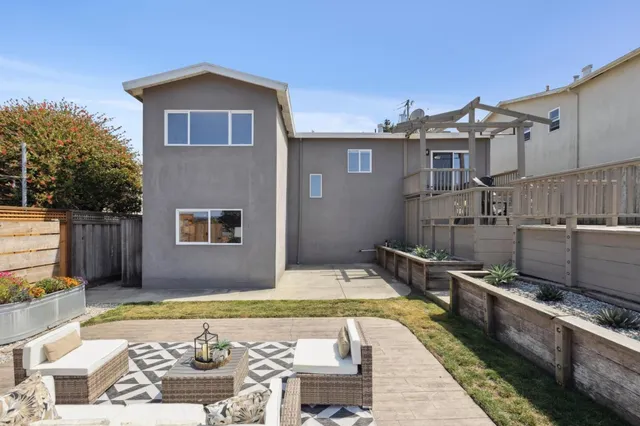an aerial view of a house with a outdoor space