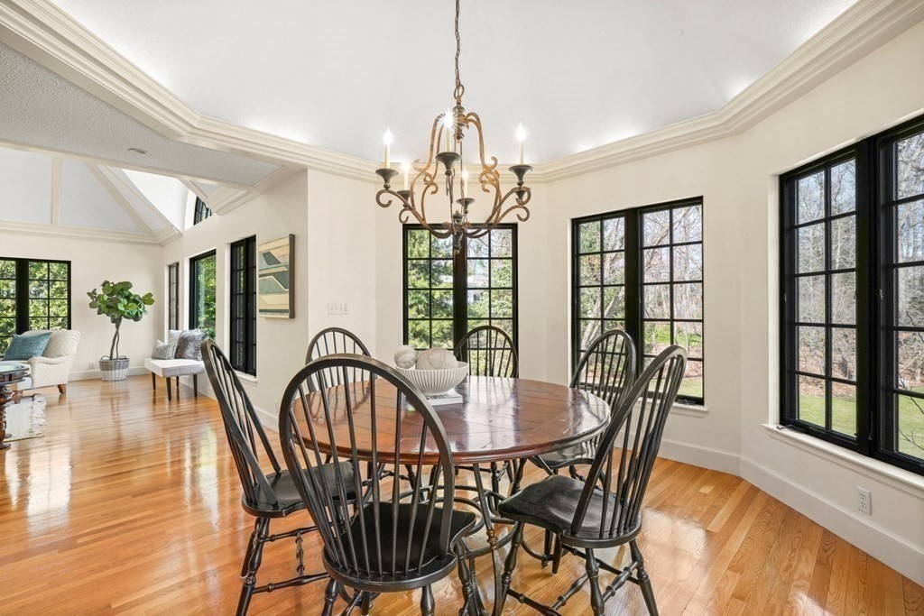 77 Woodcliff Road Wellesley, MA 02481 - Photo 22 of 42 a view of a dining room with furniture window and wooden floor