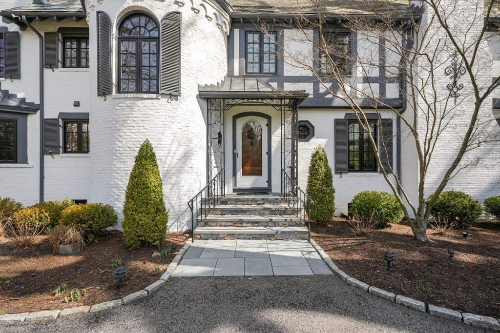 77 Woodcliff Road Wellesley, MA 02481 - Photo 3 of 42 a front view of a house