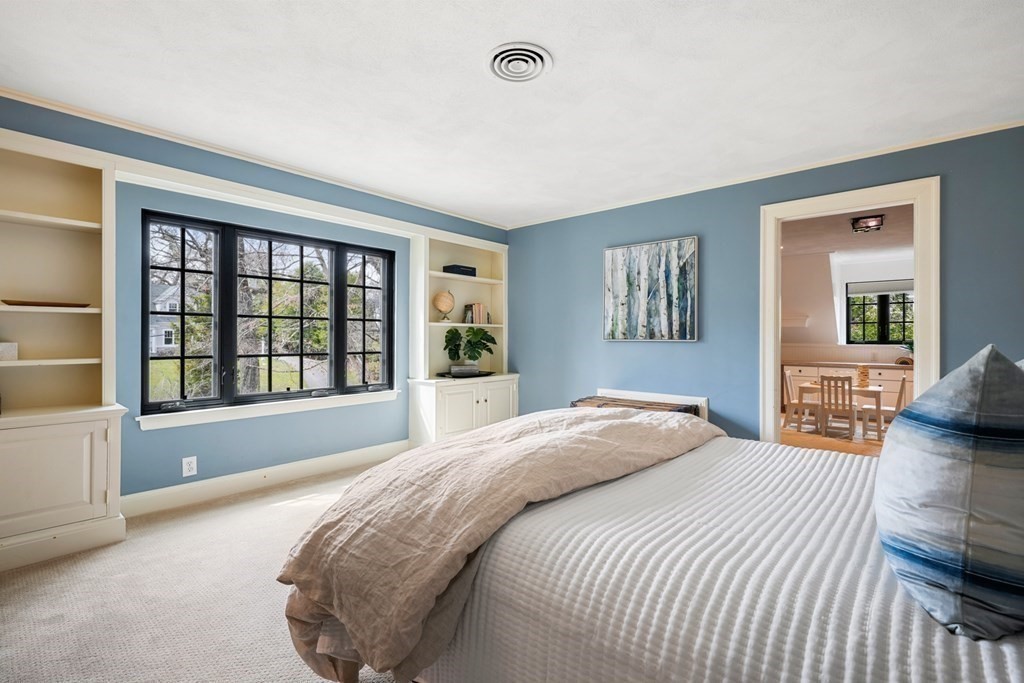 77 Woodcliff Road Wellesley, MA 02481 - Photo 31 of 42 a bedroom with a large bed and a large window