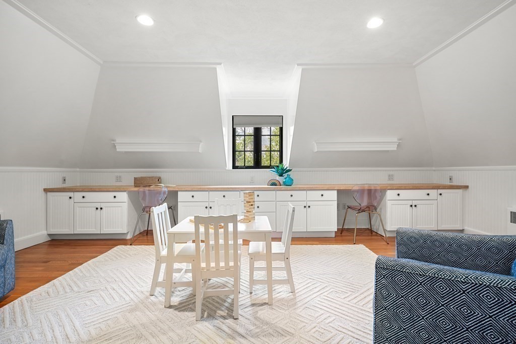 77 Woodcliff Road Wellesley, MA 02481 - Photo 32 of 42 a living room with furniture and a wooden floor