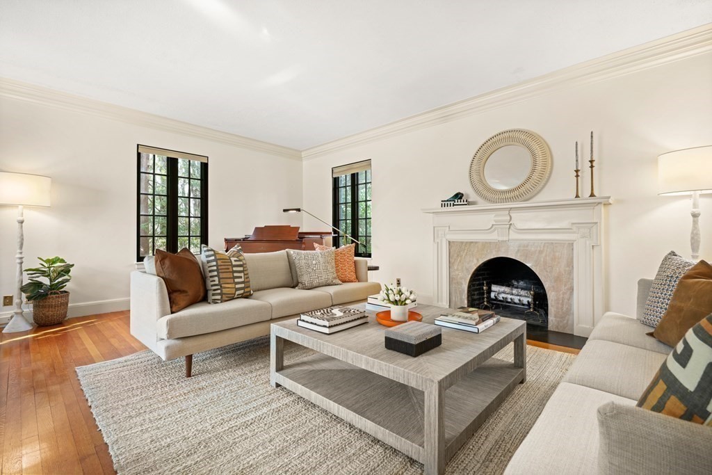 77 Woodcliff Road Wellesley, MA 02481 - Photo 8 of 42 a living room with furniture and a fireplace