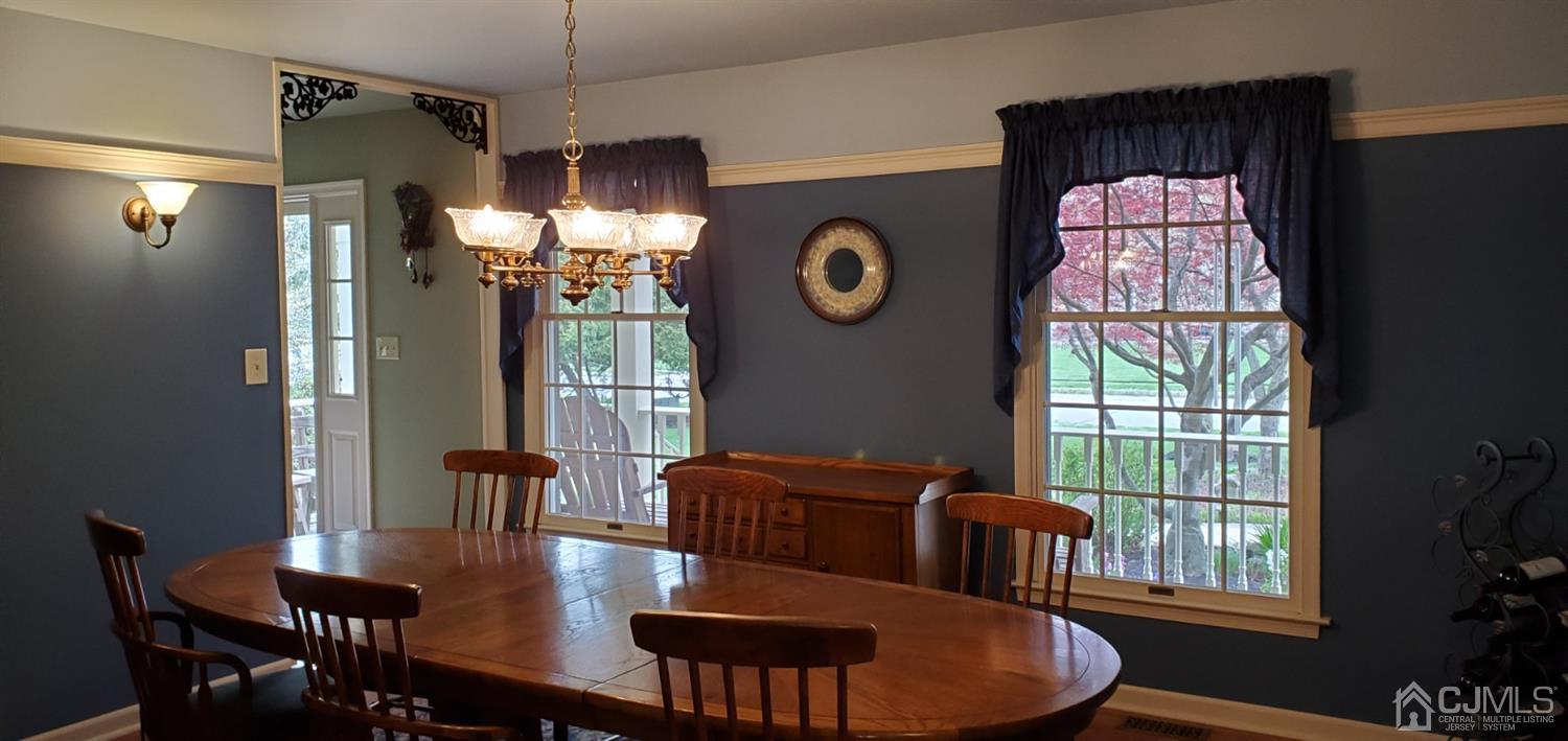 3 Interlaken Road Monmouth Junction, NJ 08852 - Photo 2 of 21 a view of a dining room with furniture window and outside view