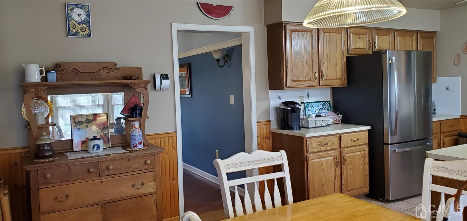 3 Interlaken Road Monmouth Junction, NJ 08852 - Photo 12 of 21 a kitchen with stainless steel appliances a refrigerator and a stove top oven