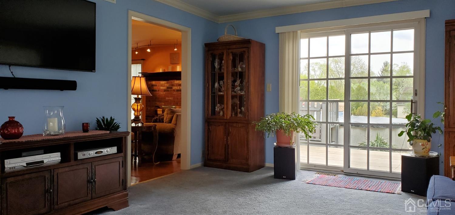 3 Interlaken Road Monmouth Junction, NJ 08852 - Photo 16 of 21 a view of hallway with furniture and a window