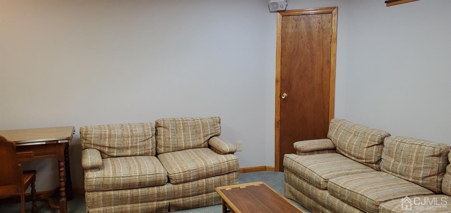 3 Interlaken Road Monmouth Junction, NJ 08852 - Photo 19 of 21 a living room with furniture and a couch