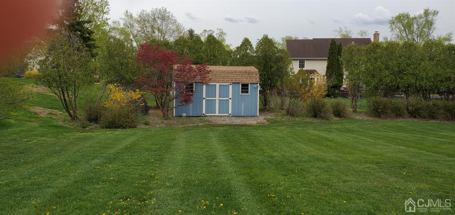 3 Interlaken Road Monmouth Junction, NJ 08852 - Photo 6 of 21 a backyard of a house with lots of green space