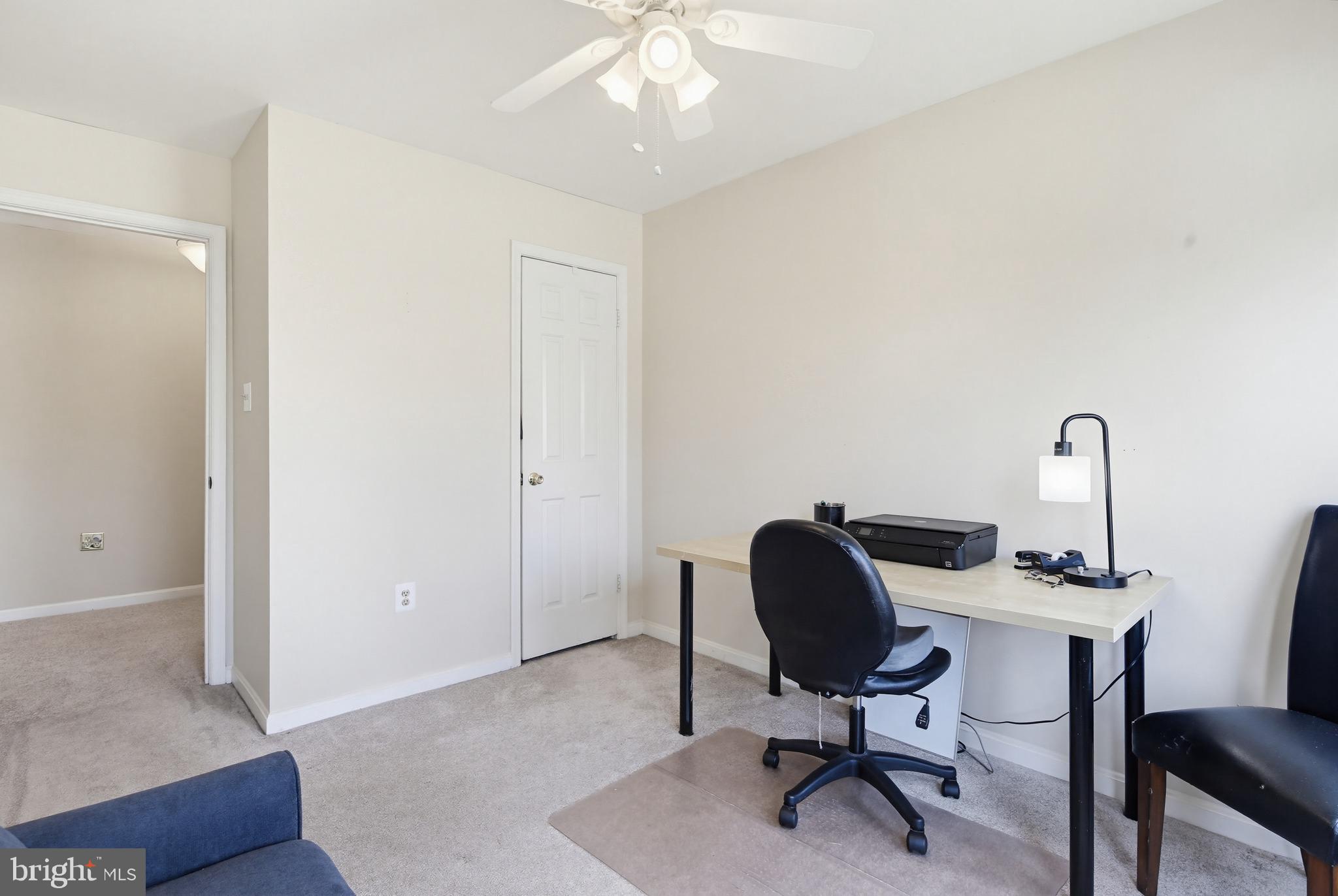 18906 Lindenhouse Road Gaithersburg, MD 20879 - Photo 31 of 48 a view of a workspace with furniture and a window