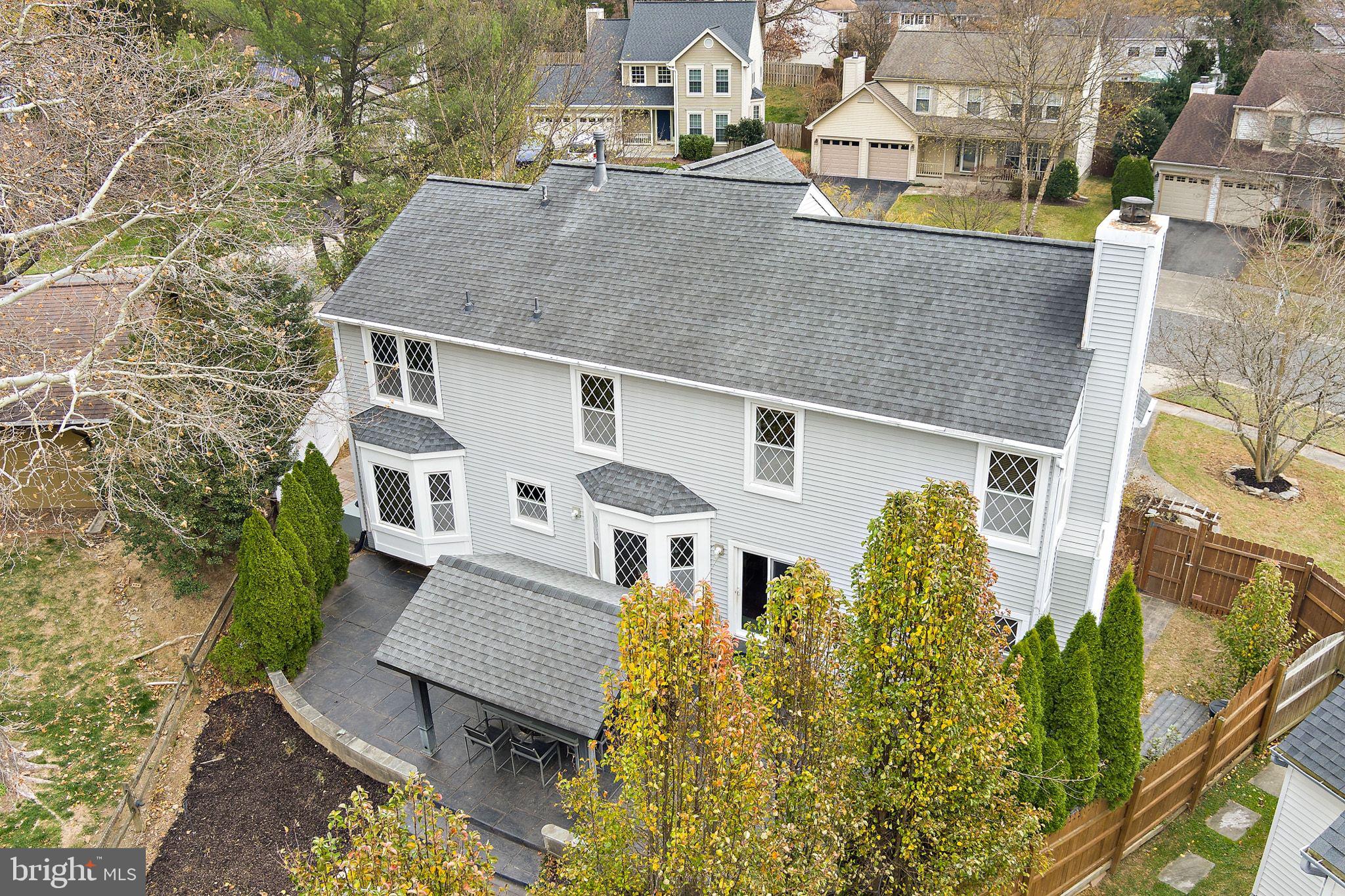 18906 Lindenhouse Road Gaithersburg, MD 20879 - Photo 44 of 48 front view of a house with a yard
