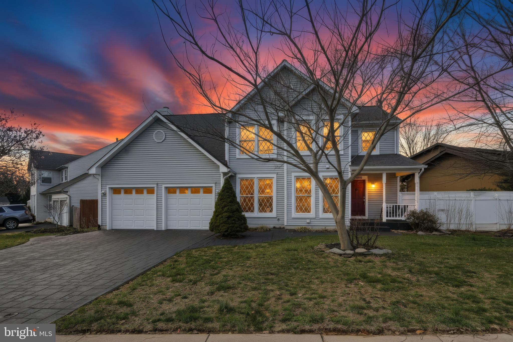 18906 Lindenhouse Road Gaithersburg, MD 20879 - Photo 48 of 48 a front view of a house with a yard