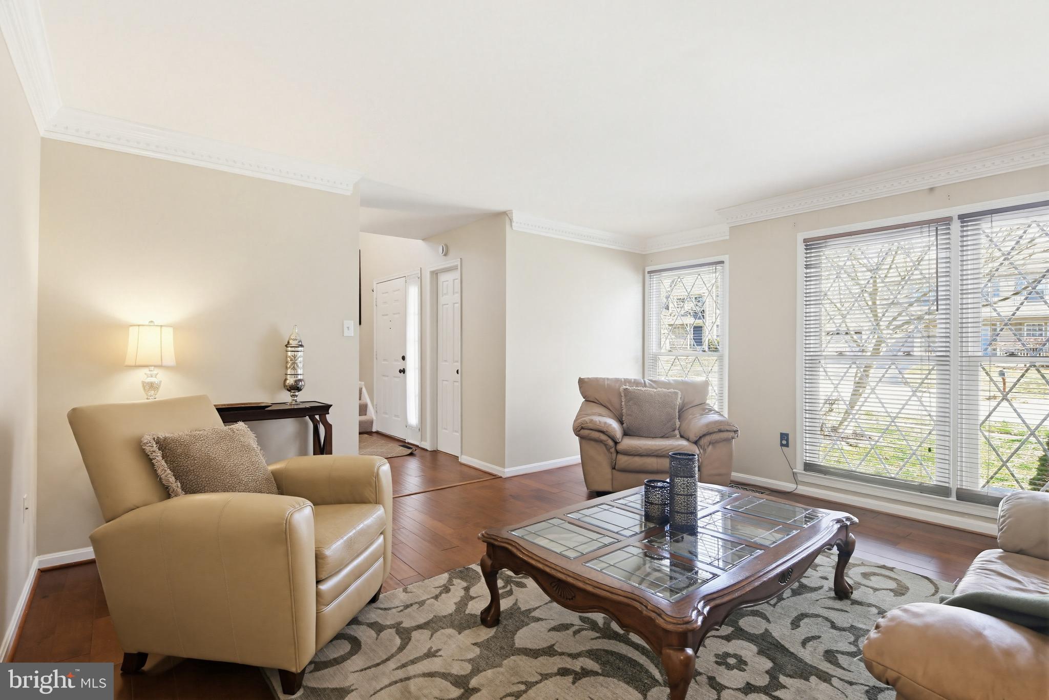 18906 Lindenhouse Road Gaithersburg, MD 20879 - Photo 6 of 48 a living room with furniture and a window