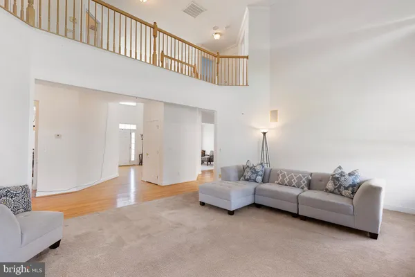 a living room with furniture and a couch