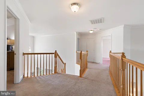 a view of hallway with livingroom