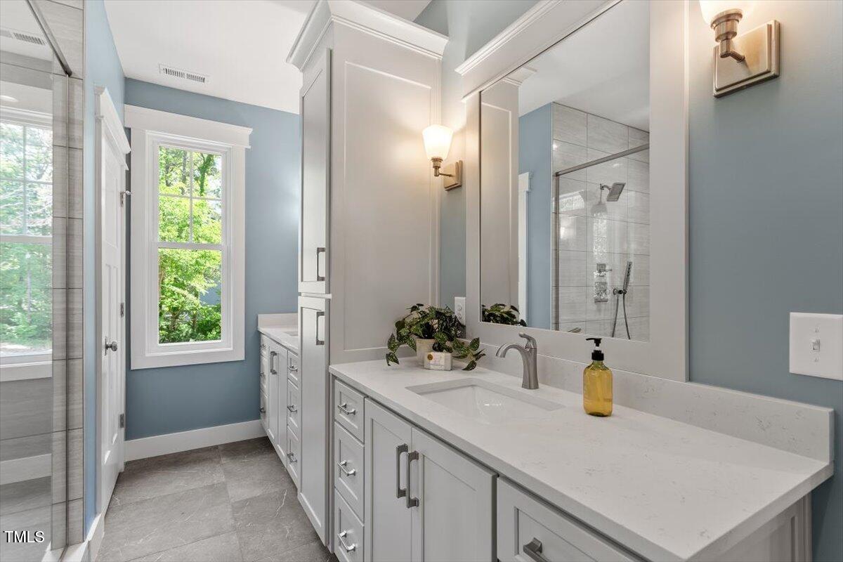 3932 Old Chapel Hill Road Durham, NC 27707 - Photo 27 of 46 a kitchen with sink and window