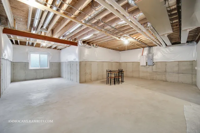 a view of a room with wooden cabinets