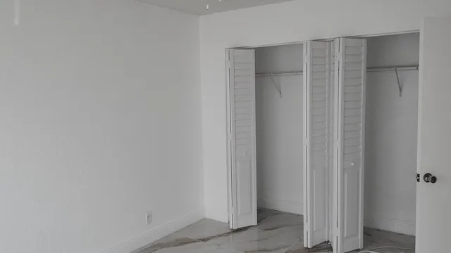 a view of a lake with a large trees